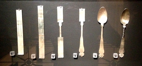A display of the making of a spoon